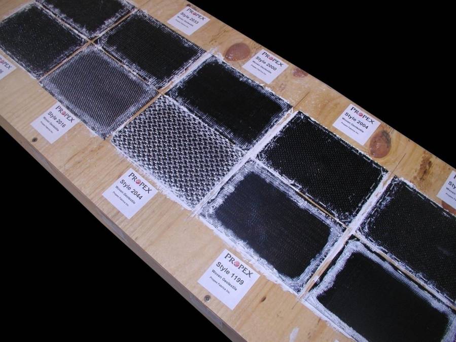 Figure 6: Installing fabric samples on plywood grid and sealing the corners.