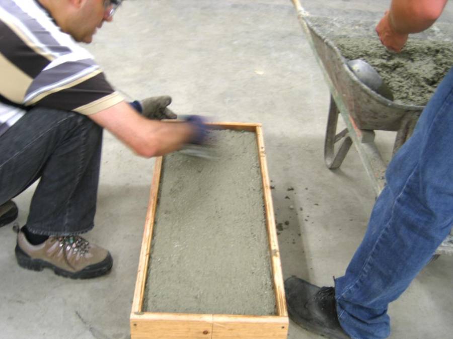 Figure 9: Filling the box with fresh concrete.