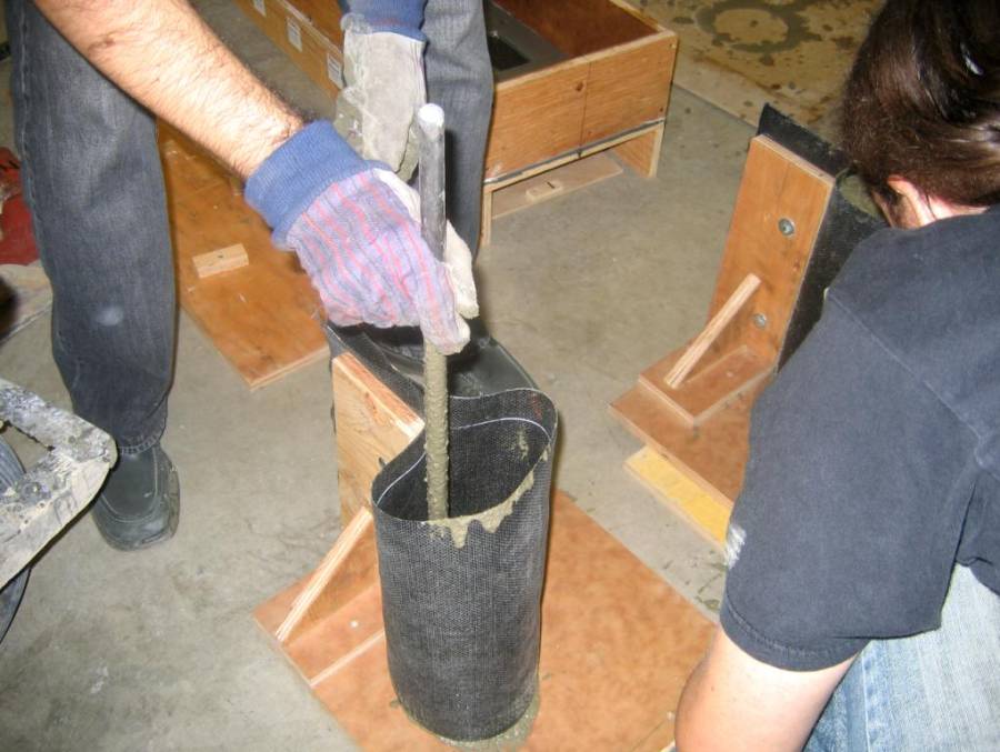 Figure 21: Compacting fresh concrete using the standard rod.